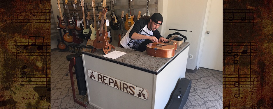 Jared adding new Guitar Strings